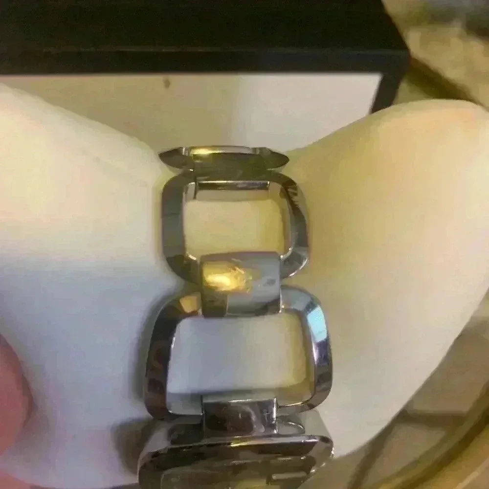 Gucci G watch Silver with Dark Bronze Face With Diamonds.